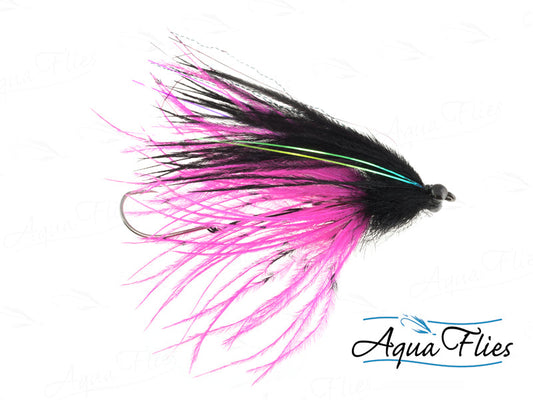 Photo of a Hot Pink/Black steelhead fly.