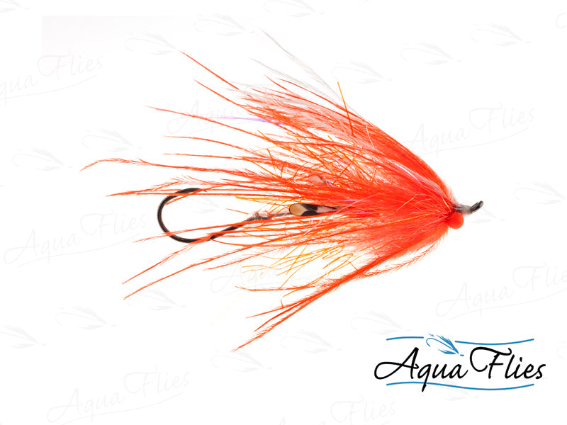 Photo of a Orange/White steelhead fly.